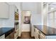 Functional kitchen with stainless steel appliances, dark countertops, and ample cabinet space for storage and meal preparation at 3820 Roswell Ne Rd # 510, Atlanta, GA 30342