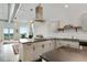 Well-equipped kitchen with stainless steel appliances, sleek countertops, a gas cooktop, and access to a balcony at 3820 Roswell Ne Rd # 510, Atlanta, GA 30342