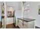 A modern kitchen features stainless steel appliances, dark countertops, and dark wood flooring at 3820 Roswell Ne Rd # 510, Atlanta, GA 30342