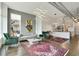 Bright and airy living room boasts modern light fixture, and comfortable seating, with an open flow to the kitchen at 3820 Roswell Ne Rd # 510, Atlanta, GA 30342