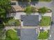 Aerial view of a home featuring a large yard, long driveway and mature trees at 1603 Ezra Church Nw Dr, Atlanta, GA 30314