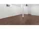 Unfinished basement with concrete columns and a ceiling fan at 1603 Ezra Church Nw Dr, Atlanta, GA 30314