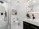 Bathroom with a glass enclosed shower, modern vanity, and stylish fixtures at 1603 Ezra Church Nw Dr, Atlanta, GA 30314