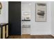 Bright bathroom boasts modern vanity, marble floors, and a stylish sliding door at 1603 Ezra Church Nw Dr, Atlanta, GA 30314