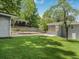Beautiful home exterior with green grass and well-manicured landscaping on a sunny day at 1603 Ezra Church Nw Dr, Atlanta, GA 30314