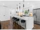 Spacious kitchen with an island, breakfast bar seating, stainless steel appliances, and recessed lighting at 1603 Ezra Church Nw Dr, Atlanta, GA 30314