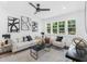 Bright living room with recessed lighting, modern decor, and large windows that fill the space with natural light at 1603 Ezra Church Nw Dr, Atlanta, GA 30314