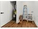 Utility room with a water heater and storage shelves at 1603 Ezra Church Nw Dr, Atlanta, GA 30314