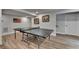 Basement area with ping pong table, neutral paint, and recessed lighting at 1882 Flowering Dr, Grayson, GA 30017