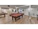 Finished basement with a pool table, foosball table, and lots of space for entertaining at 1882 Flowering Dr, Grayson, GA 30017