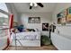 Bedroom featuring a large arched window and comfy furnishings at 1882 Flowering Dr, Grayson, GA 30017