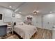 Bedroom featuring a comfortable bed, hardwood floors, and light decor at 1882 Flowering Dr, Grayson, GA 30017