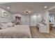 Spacious bedroom featuring hardwood floors, recessed lights, and ensuite bathroom access at 1882 Flowering Dr, Grayson, GA 30017