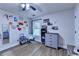 Stylish bedroom featuring laminate floors and decorative wall art at 1882 Flowering Dr, Grayson, GA 30017