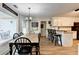 Eat-in kitchen featuring a breakfast bar and stainless steel appliances at 1882 Flowering Dr, Grayson, GA 30017