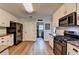 Kitchen featuring stainless steel appliances and white cabinetry at 1882 Flowering Dr, Grayson, GA 30017