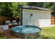 Inviting backyard features a stock tank pool and an adjacent deck with seating at 1256 Euclid Ne Ave, Atlanta, GA 30307