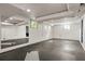 A finished basement with rubber floor, mirror, and white walls at 1256 Euclid Ne Ave, Atlanta, GA 30307