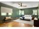 Cozy bedroom featuring hardwood floors, neutral color palette, and ample natural light at 1256 Euclid Ne Ave, Atlanta, GA 30307