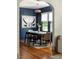 Dining room with blue accent walls and a large bull art piece at 1256 Euclid Ne Ave, Atlanta, GA 30307