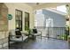 Cozy covered porch with modern furniture and black metal railings at 1256 Euclid Ne Ave, Atlanta, GA 30307