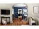 Open concept living room with archway leading to the dining room at 1256 Euclid Ne Ave, Atlanta, GA 30307