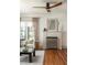 Bright living room features a ceiling fan and a decorative fireplace at 1256 Euclid Ne Ave, Atlanta, GA 30307