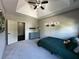 A bedroom features a vaulted ceiling, neutral walls, and carpet flooring at 2657 Gray Mill Way, Loganville, GA 30052