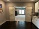 View into bonus room that has 2 blue chairs and a small trampoline at 2657 Gray Mill Way, Loganville, GA 30052