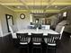 Large dining room with trey ceilings and an open view to the kitchen at 2657 Gray Mill Way, Loganville, GA 30052