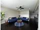 A cozy living room with dark hardwood floors and modern furnishings at 2657 Gray Mill Way, Loganville, GA 30052