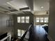 Second story loft area with hardwood floors and beautiful views of the living room below at 2657 Gray Mill Way, Loganville, GA 30052