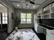 Comfortable home office featuring built-in shelving and a large window for natural light at 2657 Gray Mill Way, Loganville, GA 30052
