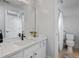 Bathroom featuring a single vanity and a toilet with shower-tub combination at 5440 Old Haven Ct, Cumming, GA 30041
