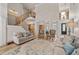 Inviting living room featuring high ceilings, hardwood floors, and stylish furnishings at 5440 Old Haven Ct, Cumming, GA 30041