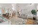 Spacious living room with soaring ceilings, hardwood floors, and neutral decor at 5440 Old Haven Ct, Cumming, GA 30041