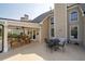 Charming outdoor patio with comfortable seating, ideal for relaxing and enjoying the tranquil backyard setting at 5440 Old Haven Ct, Cumming, GA 30041