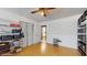 Bright bedroom with storage shelves and a ceiling fan for added comfort at 6 Fairfield Dr, Ellenwood, GA 30294