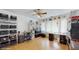 Bedroom featuring a large window with natural light, and ample storage shelving at 6 Fairfield Dr, Ellenwood, GA 30294