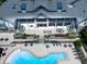 Enjoy community amenities from above, including fire pit, seating, pool, and lush greenery at 603 Canyon Overlook, Canton, GA 30114