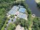 Enjoy tennis courts near a peaceful lake, creating a serene and active lifestyle at 603 Canyon Overlook, Canton, GA 30114