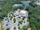Enjoy community amenities from above, including tennis courts, pool, clubhouse and lush greenery at 603 Canyon Overlook, Canton, GA 30114
