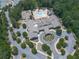Enjoy community amenities from above, including tennis courts, pool, clubhouse and lush greenery at 603 Canyon Overlook, Canton, GA 30114