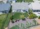 Aerial view of a fenced backyard with patio, landscaping, and well-maintained lawn at 603 Canyon Overlook, Canton, GA 30114
