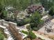 Tranquil community garden with stone pathways, raised beds, and seating areas offering a peaceful retreat at 603 Canyon Overlook, Canton, GA 30114