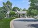 Community entrance with covered gatehouse and landscaped grounds at 603 Canyon Overlook, Canton, GA 30114