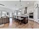 Modern kitchen with a large island, stainless steel appliances, and open layout at 603 Canyon Overlook, Canton, GA 30114