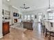 Bright living room featuring a fireplace, built-in shelves, and hardwood floors at 603 Canyon Overlook, Canton, GA 30114