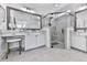 Modern main bathroom with double sinks, a make up counter, and a glass shower at 603 Canyon Overlook, Canton, GA 30114
