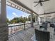 Scenic view from the covered patio overlooking the refreshing pool and lush landscape at 603 Canyon Overlook, Canton, GA 30114